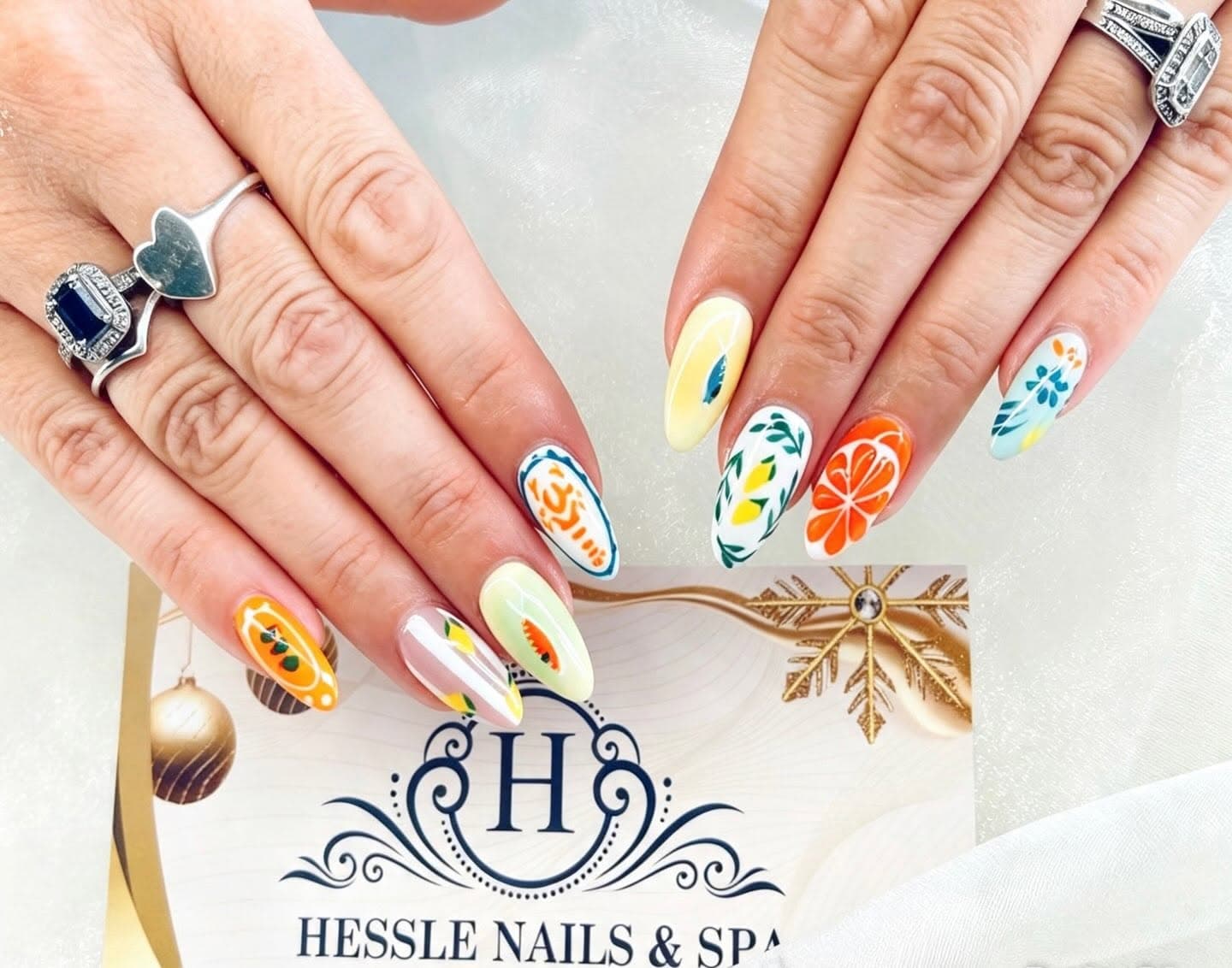 Colourful hand-painted fruit nail art